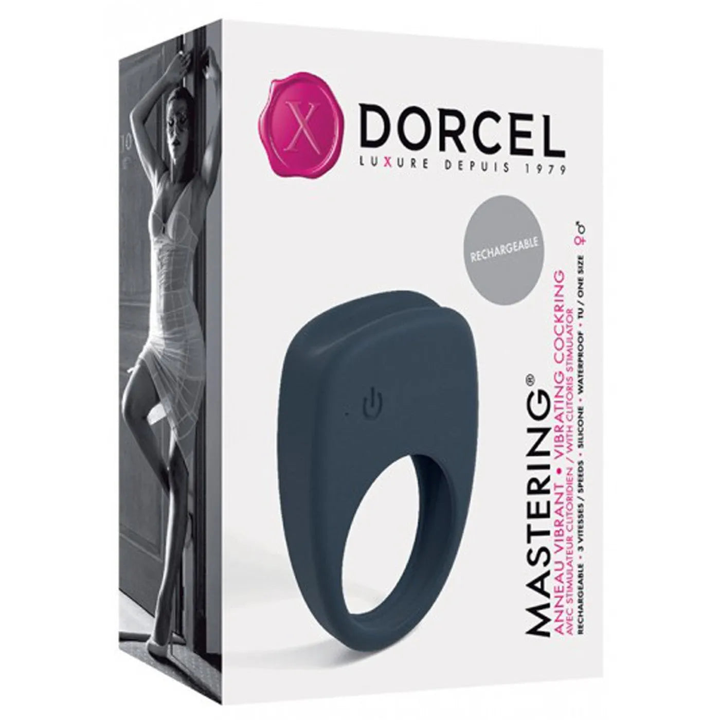 Anneau pénien noir en silicone doux, rechargeable, avec stimulation clitoridienne, sur fond de boîte élégante.