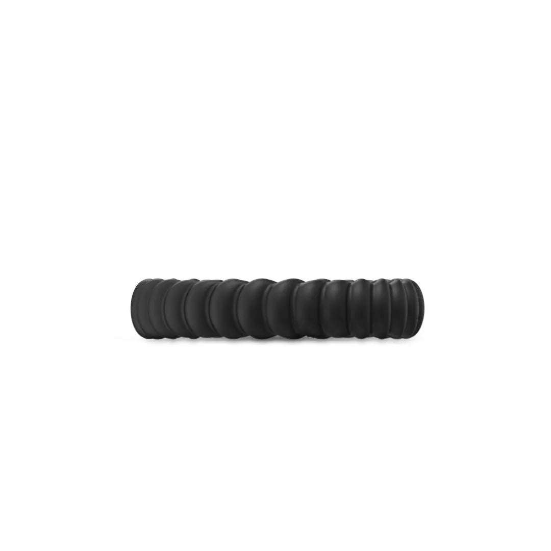 Anneau silicone noir double stimulation, cannelé, flexible, étanche, pour érections longues et confortables.