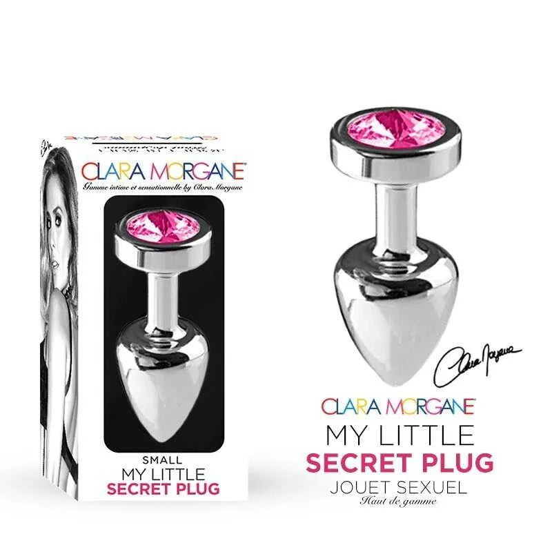 Plug anal aluminium rose avec bijou, compact et étanche, sur fond blanc avec emballage illustré.