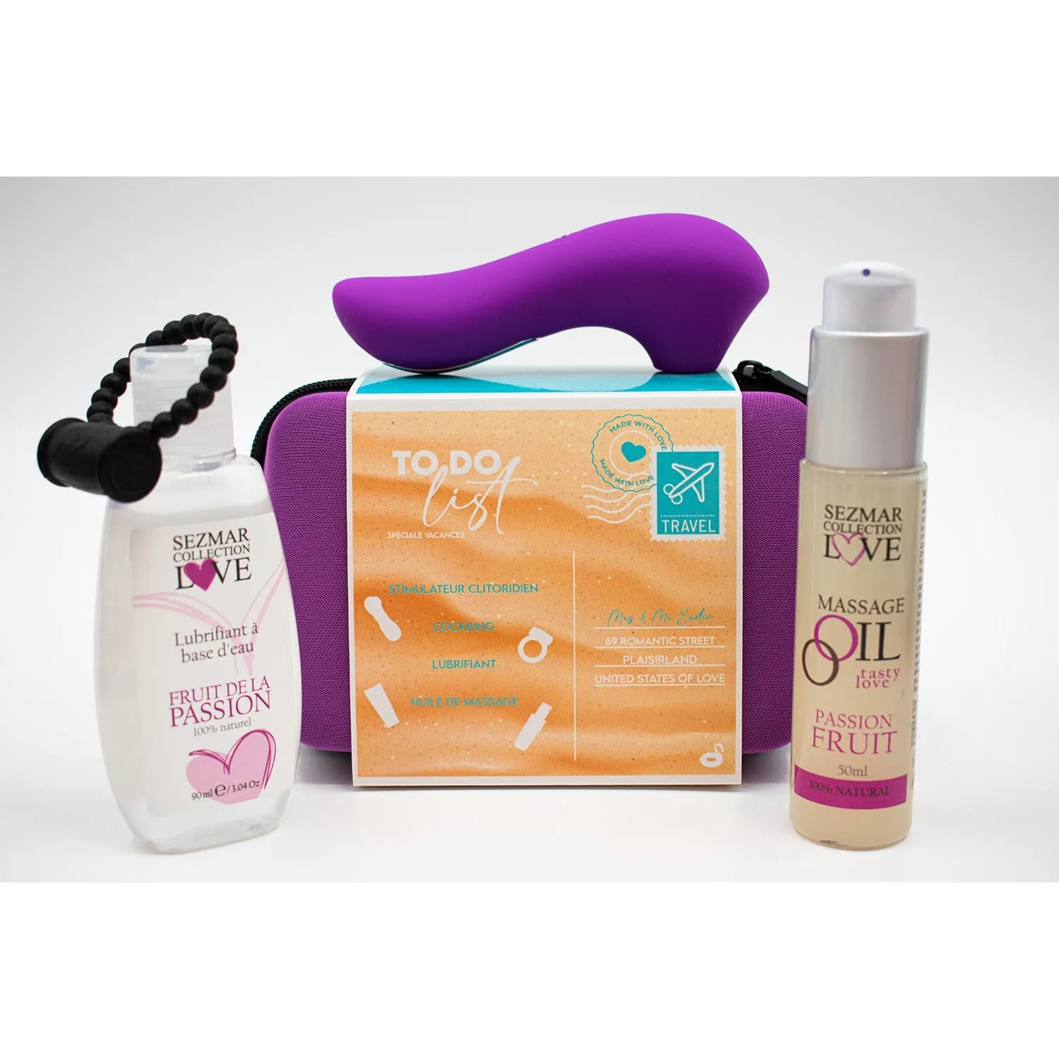 Box Hot Summer avec stimulateur violet, lubrifiant fruit de la passion, huile de massage, et étui nomade orange.