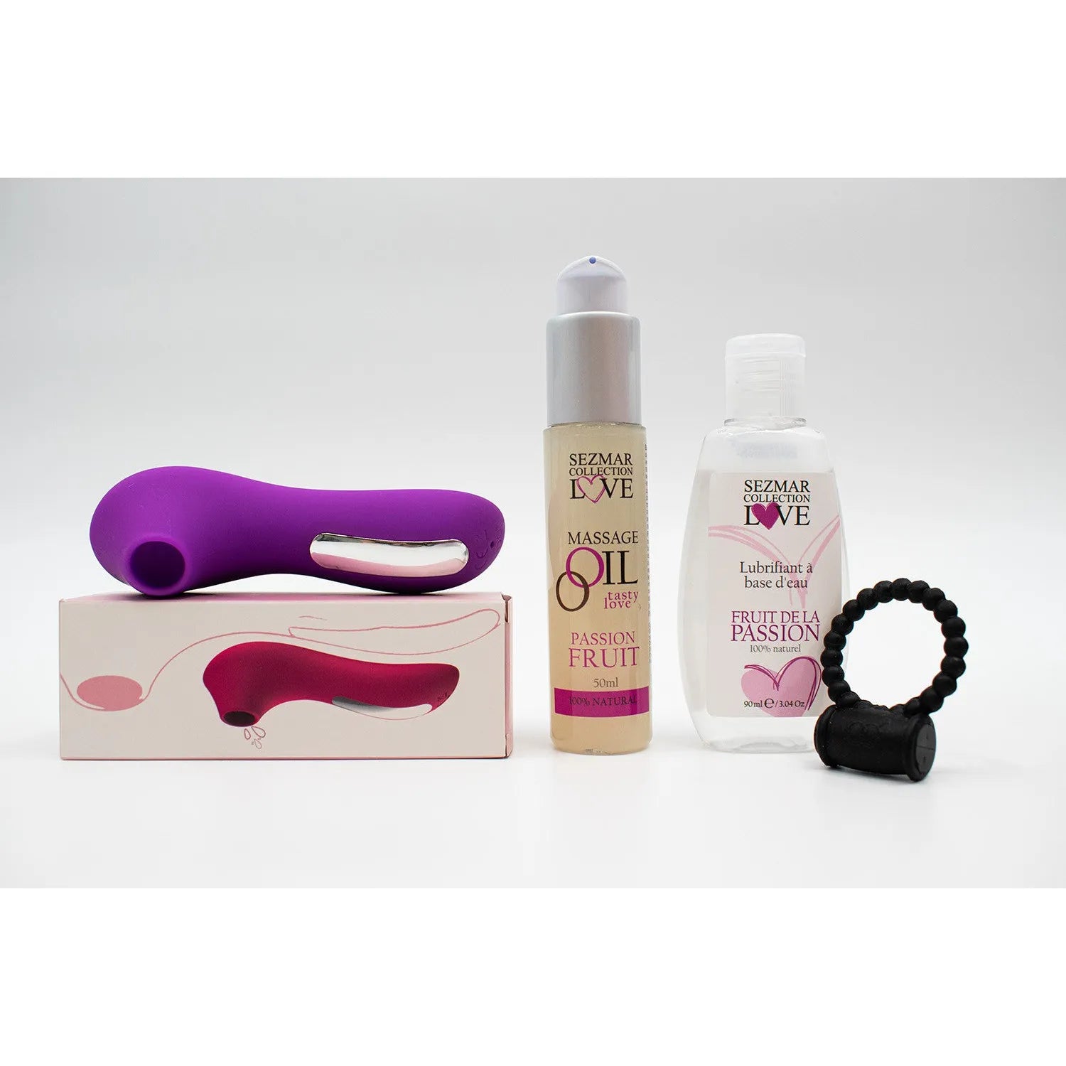 Box Hot Summer avec stimulateur violet, anneau noir, huile massage fruit de la passion, lubrifiant hydrosoluble.