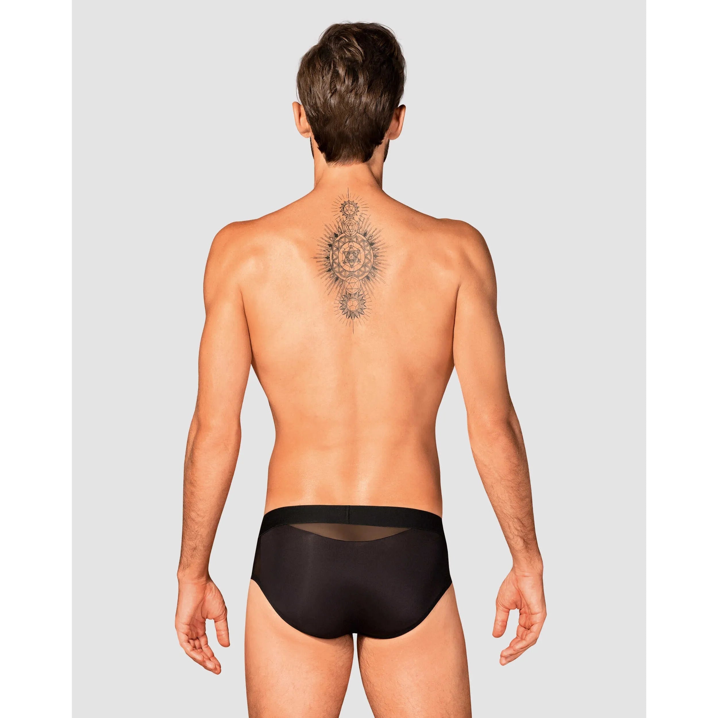 Slip Boldero noir homme, coupe classique, maille transparente, pendentif argent, élégant et confortable, vue arrière.