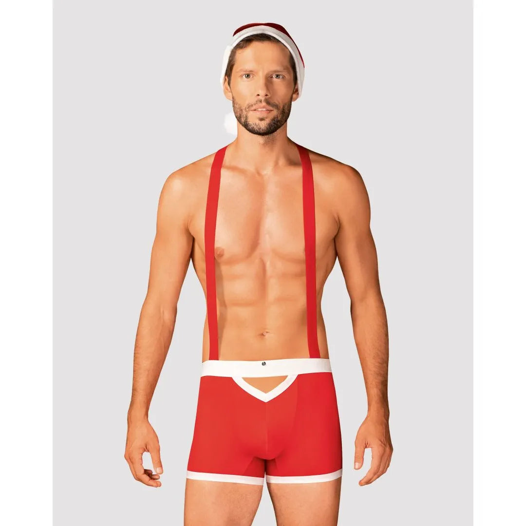 Caleçon rouge homme style Père Noël avec bretelles réglables, bonnet à pompon, laçage ajusté, festif et élégant.
