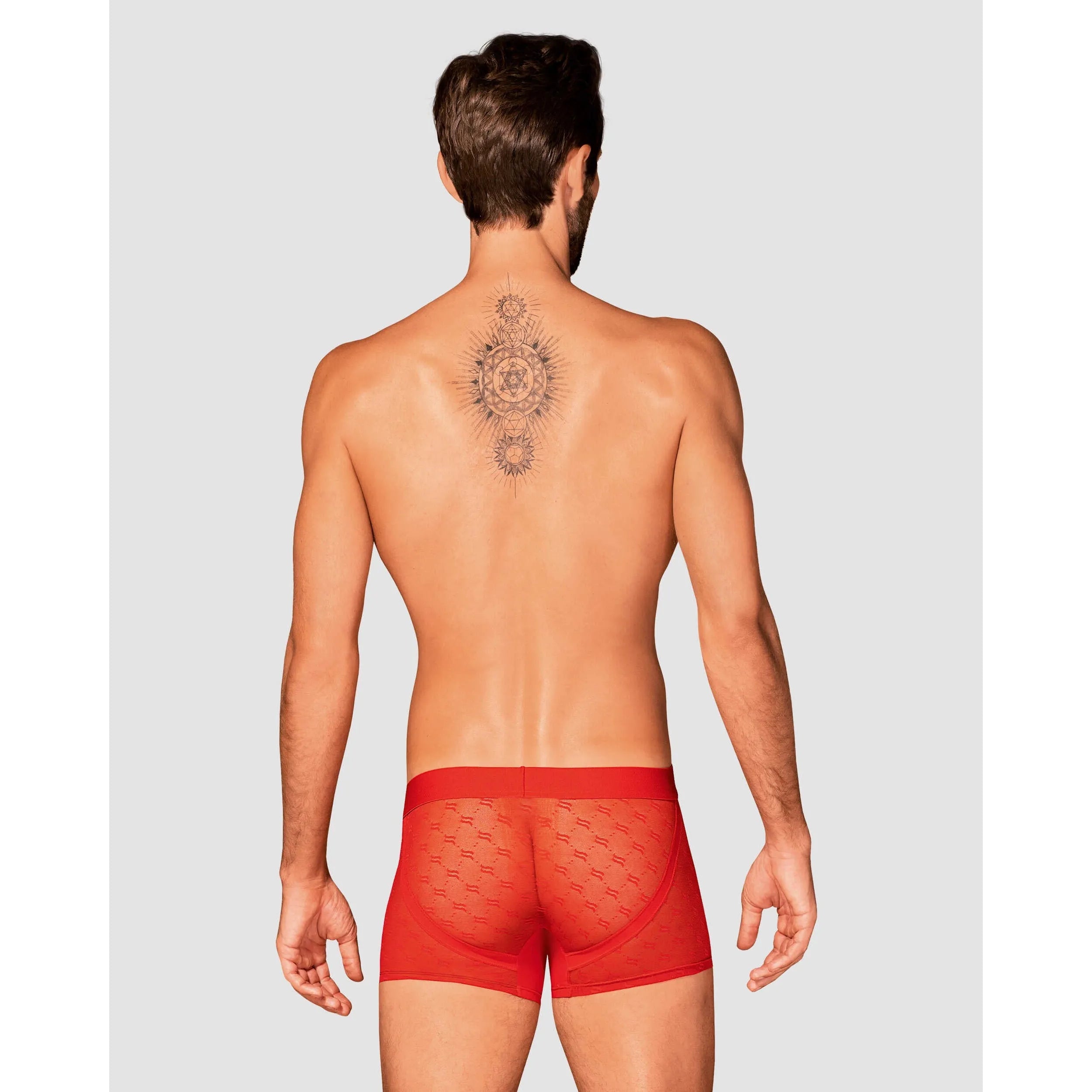 Caleçon homme rouge translucide moulant, logo monogramme, confort élasthanne, sensualité moderne et élégante.