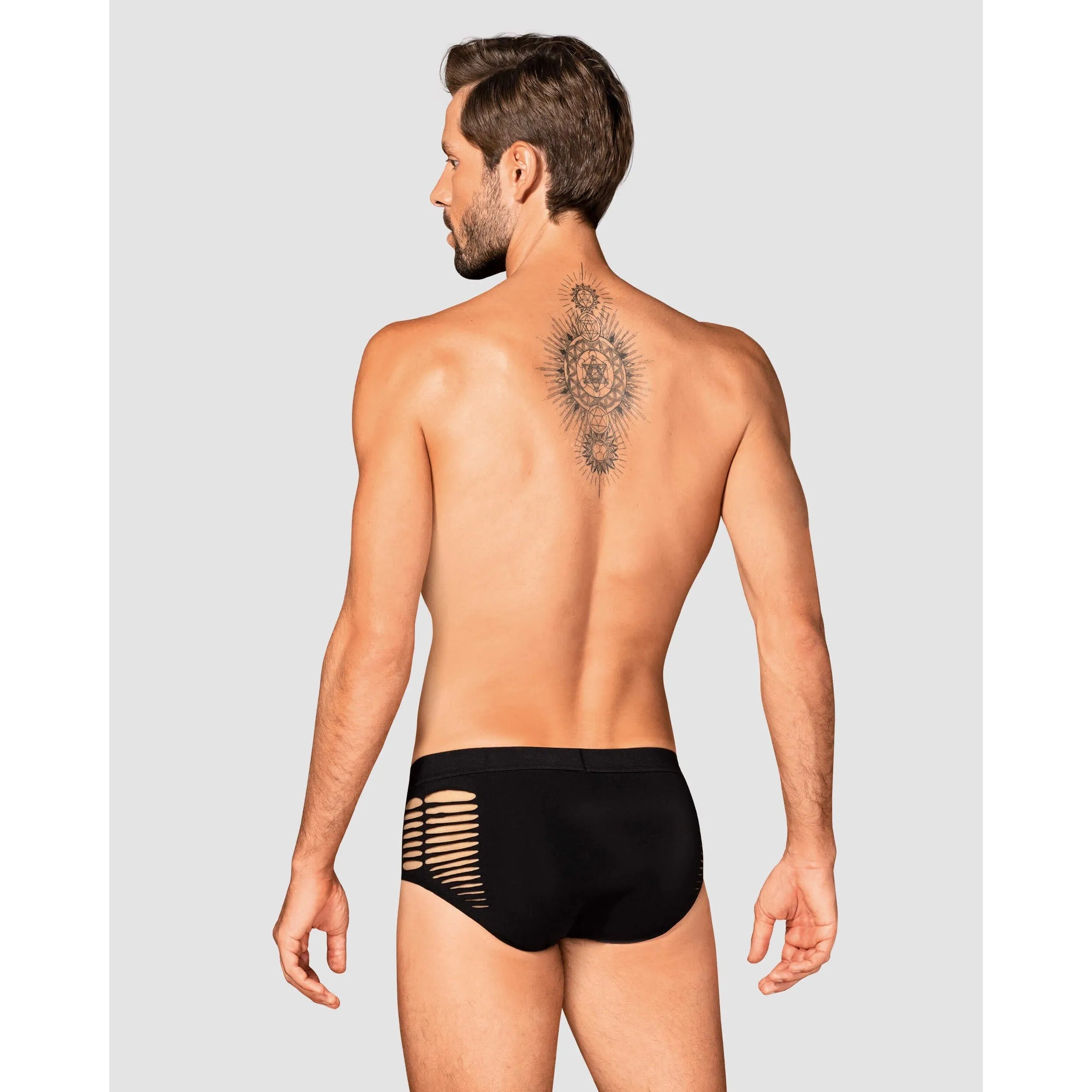 Culotte homme noire moderne avec découpes sexy, maille élastique, ajustée, silhouette sculptante, vue de dos.