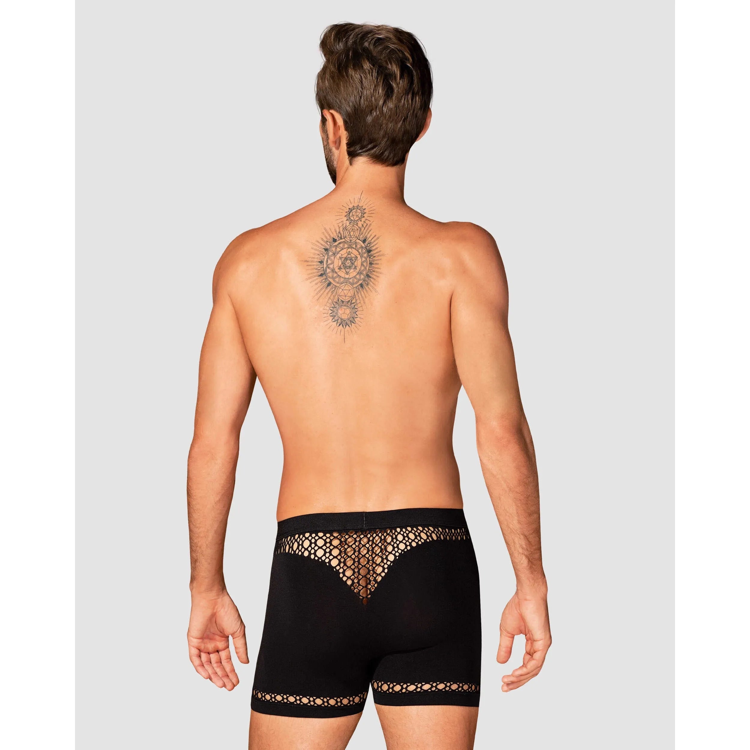 Boxer homme noir M102 motifs géométriques, coupe moderne, élégant et confortable, en nylon élasthanne extensible.