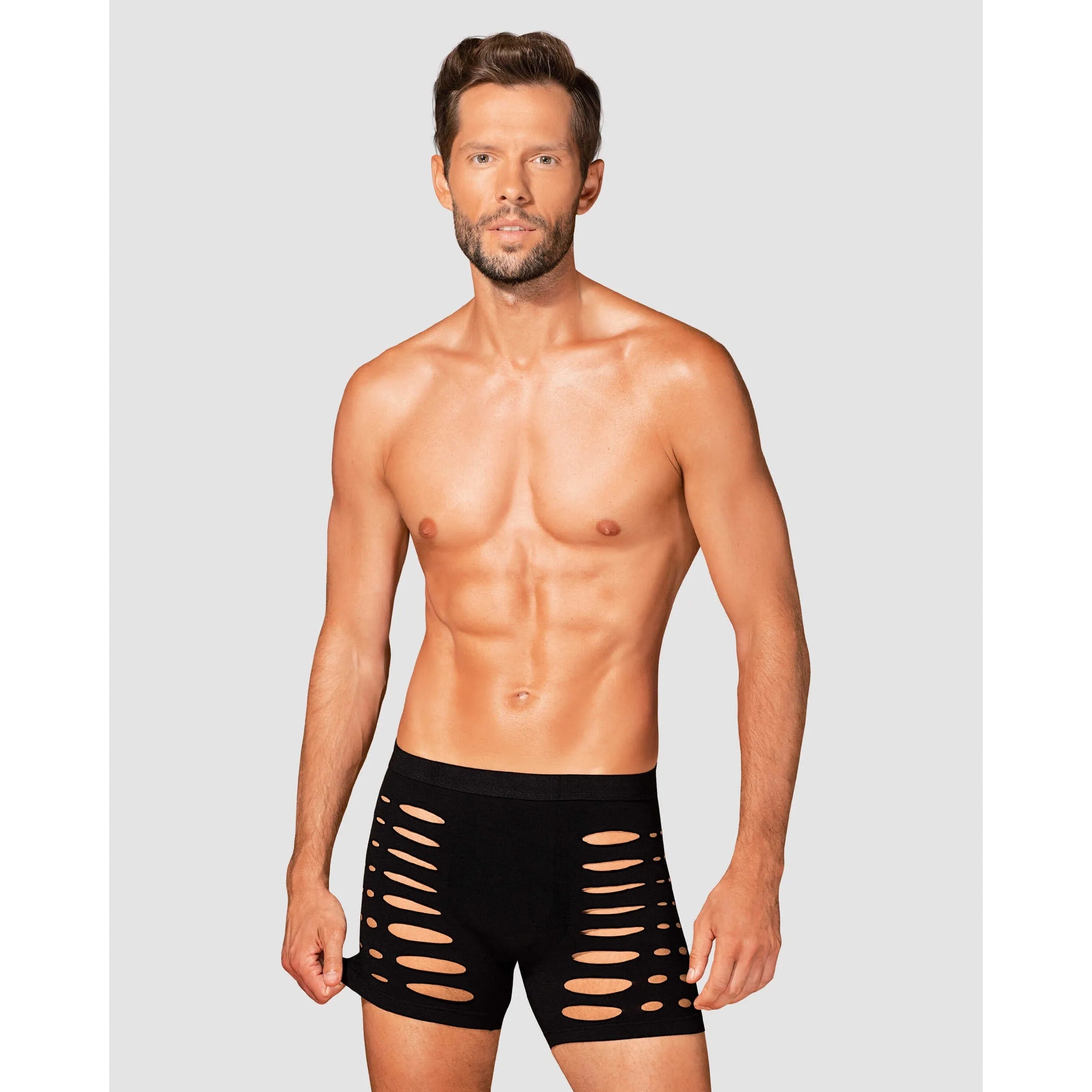 Caleçon noir homme M104, coupe silhouette, découpes audacieuses, matière élastique, allure sexy et confortable.