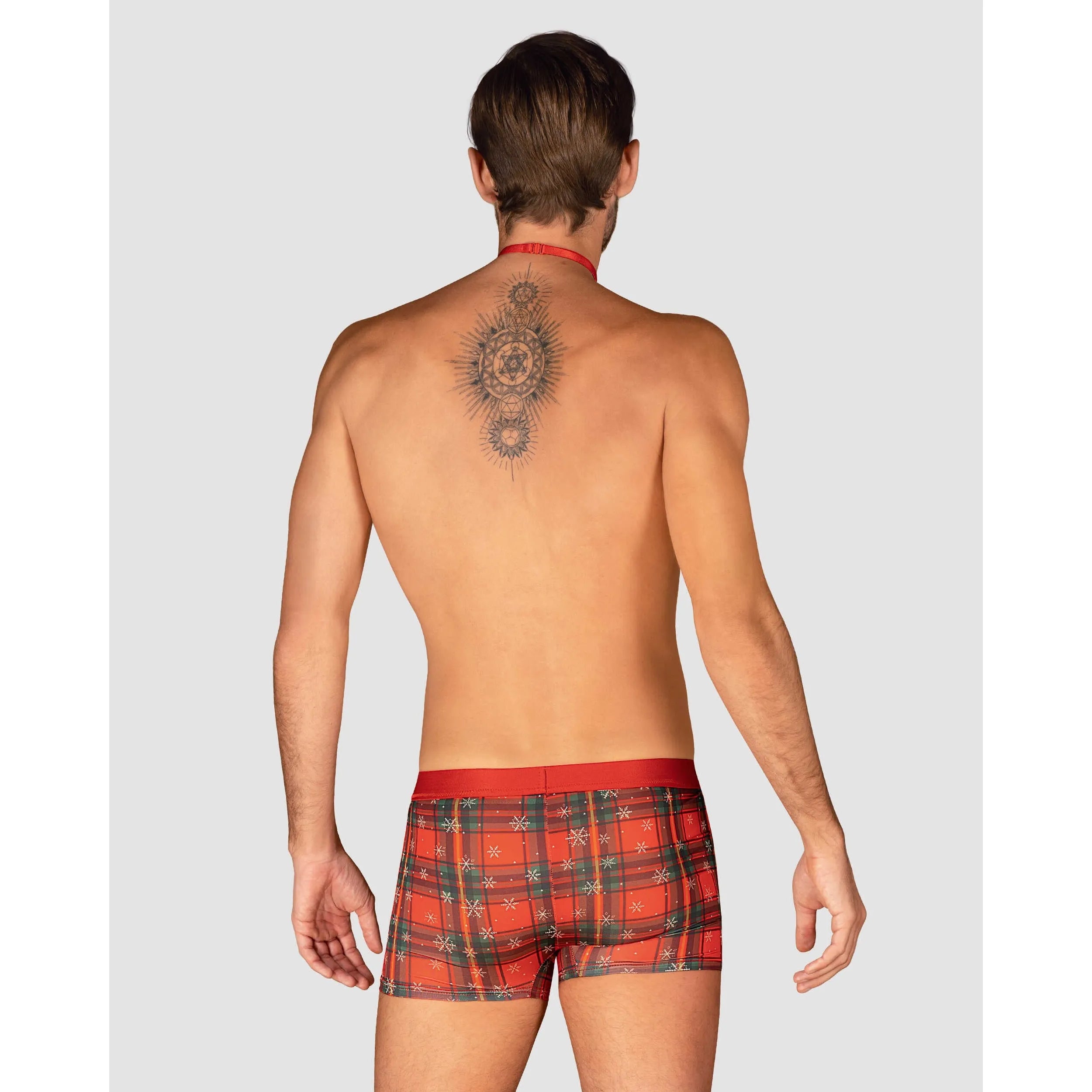 Boxer Noël homme rouge à motif festif, nœud papillon, pendentif or, coupe ajustée, élégant et confortable.
