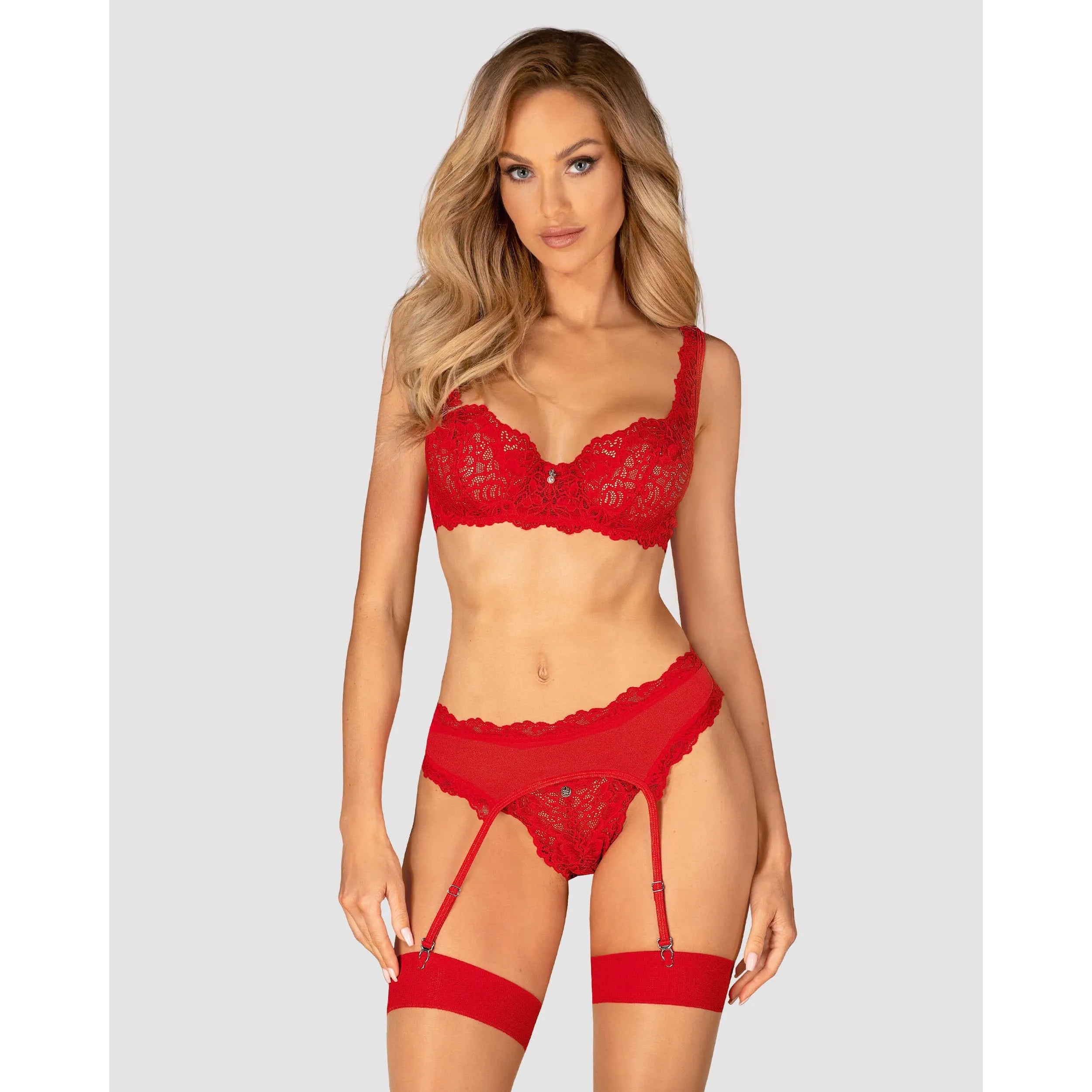 Ensemble lingerie rouge en dentelle avec soutien-gorge, porte-jarretelles et string, bretelles ajustables, style séduisant.