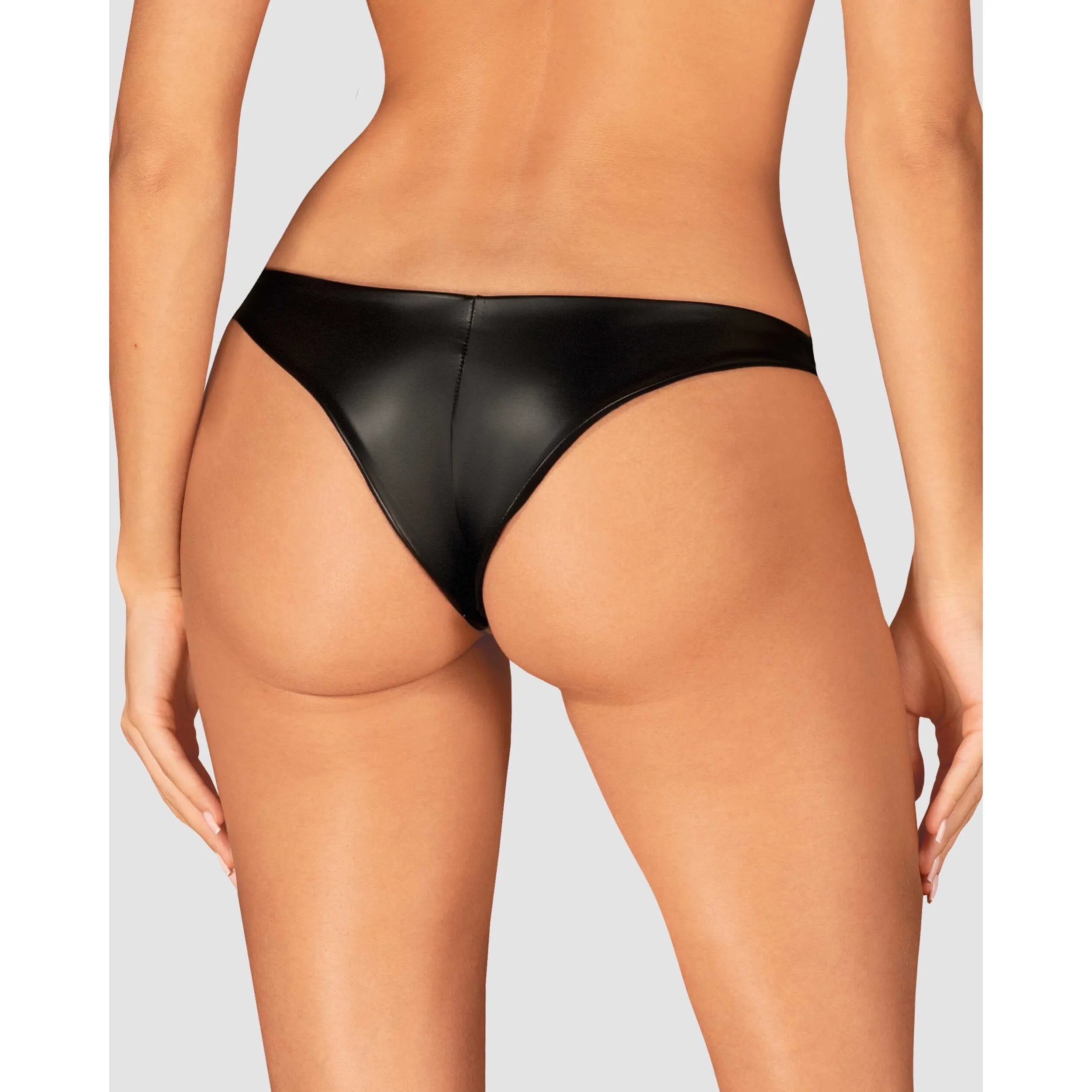 Culotte noire satinée moulante avec connecteurs ronds et pendentif, élégante et confortable, en viscose et élasthanne.
