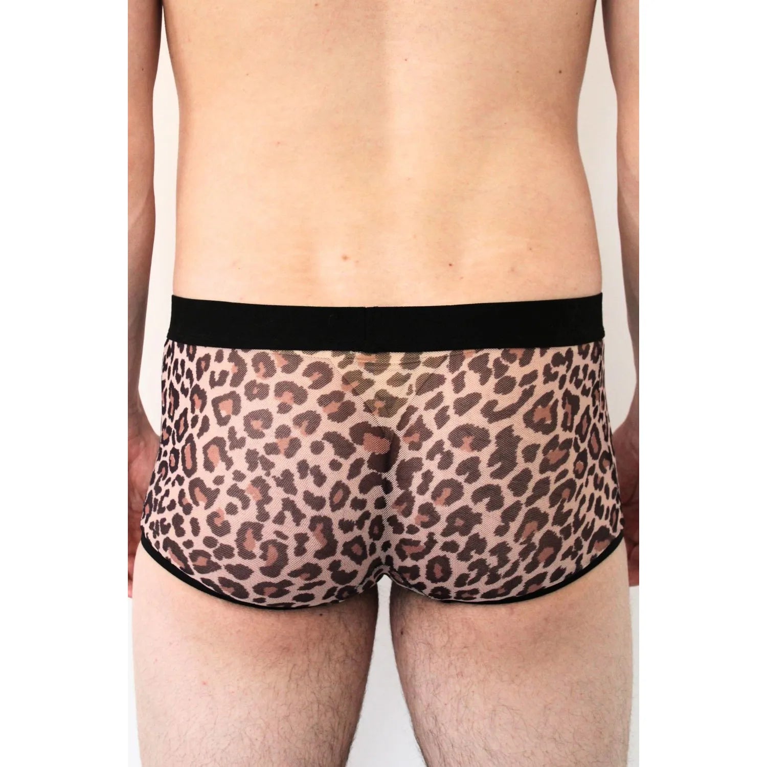 Boxer résille transparent léopard, ceinture élastique noire, design urbain et séduisant, valorisant la silhouette.