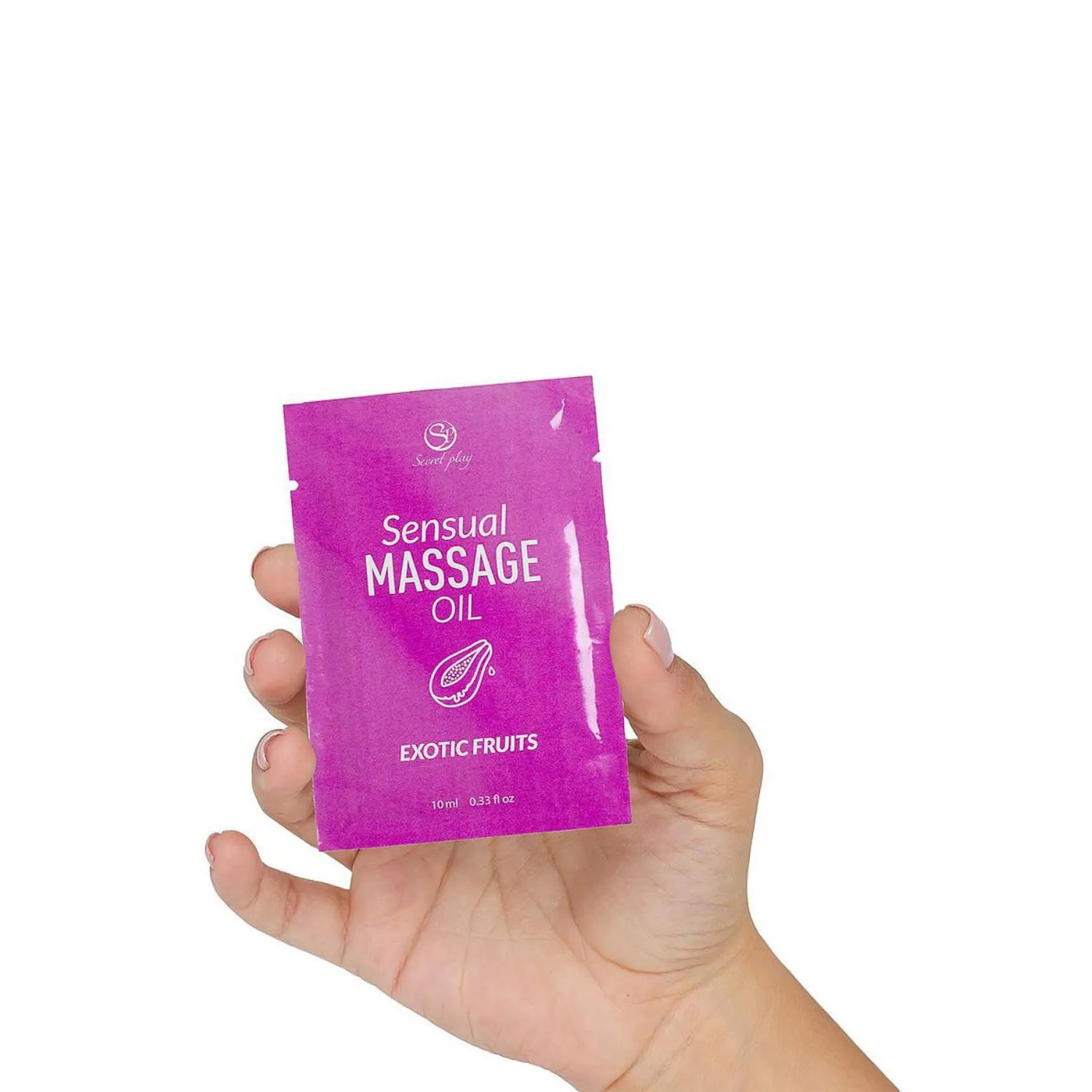Dosette huile de massage fruits exotiques 10 ml, emballage violet, tenue en main, format pratique pour détente.
