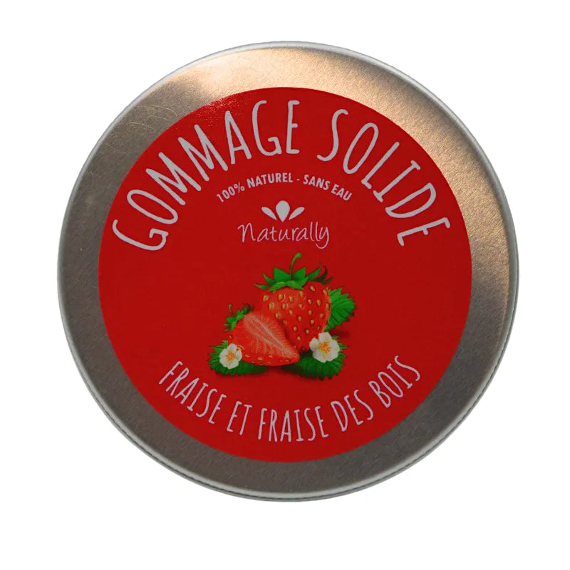 Boîte ronde en métal avec étiquette rouge, illustration de fraises, texte Gommage Solide Fraise et Fraise des Bois.