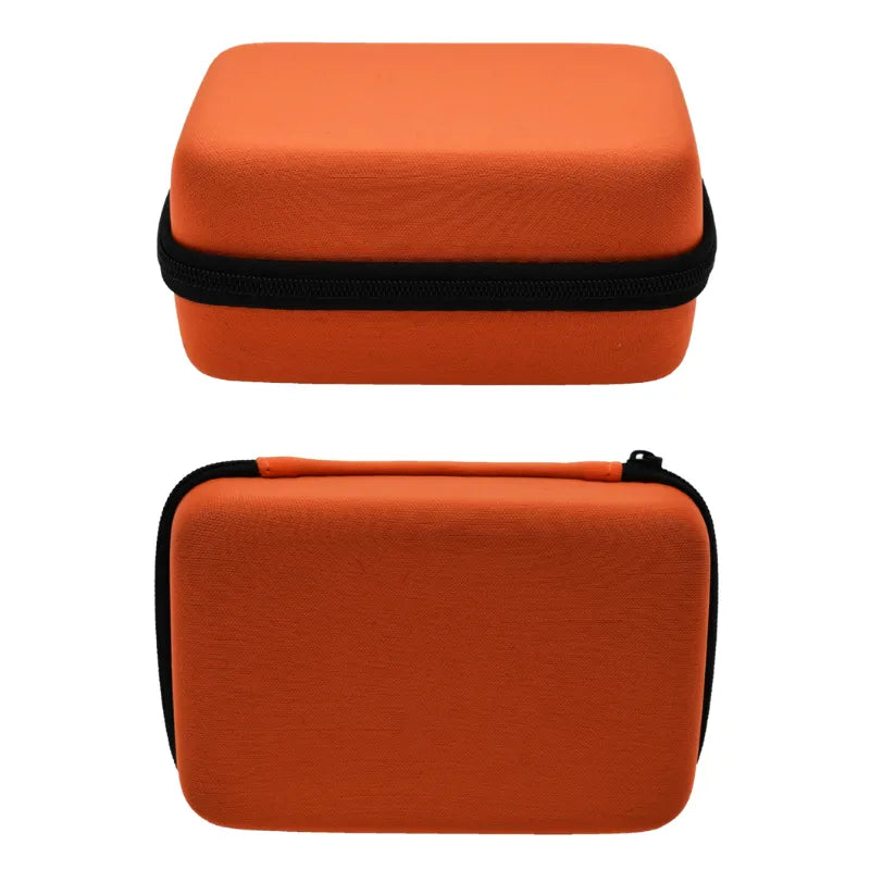 Coffret soin visage orange, rectangulaire, fermeture éclair noire, pour gommage, masque, patchs yeux bio hydratants.