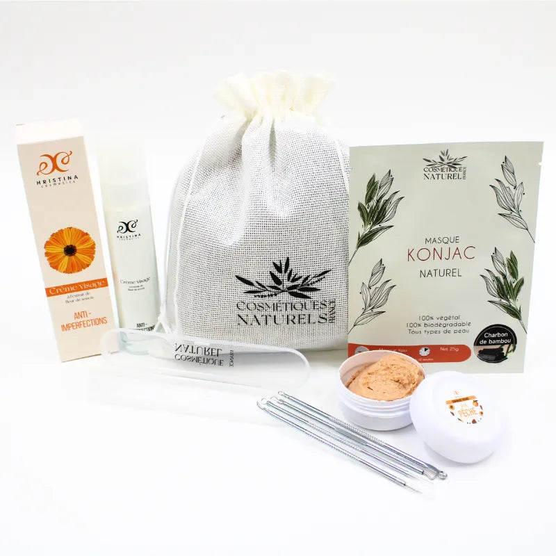 Coffret soin anti-imperfections naturel, produits exfoliants et hydratants, charbon bambou, peau acnéique, packaging élégant.