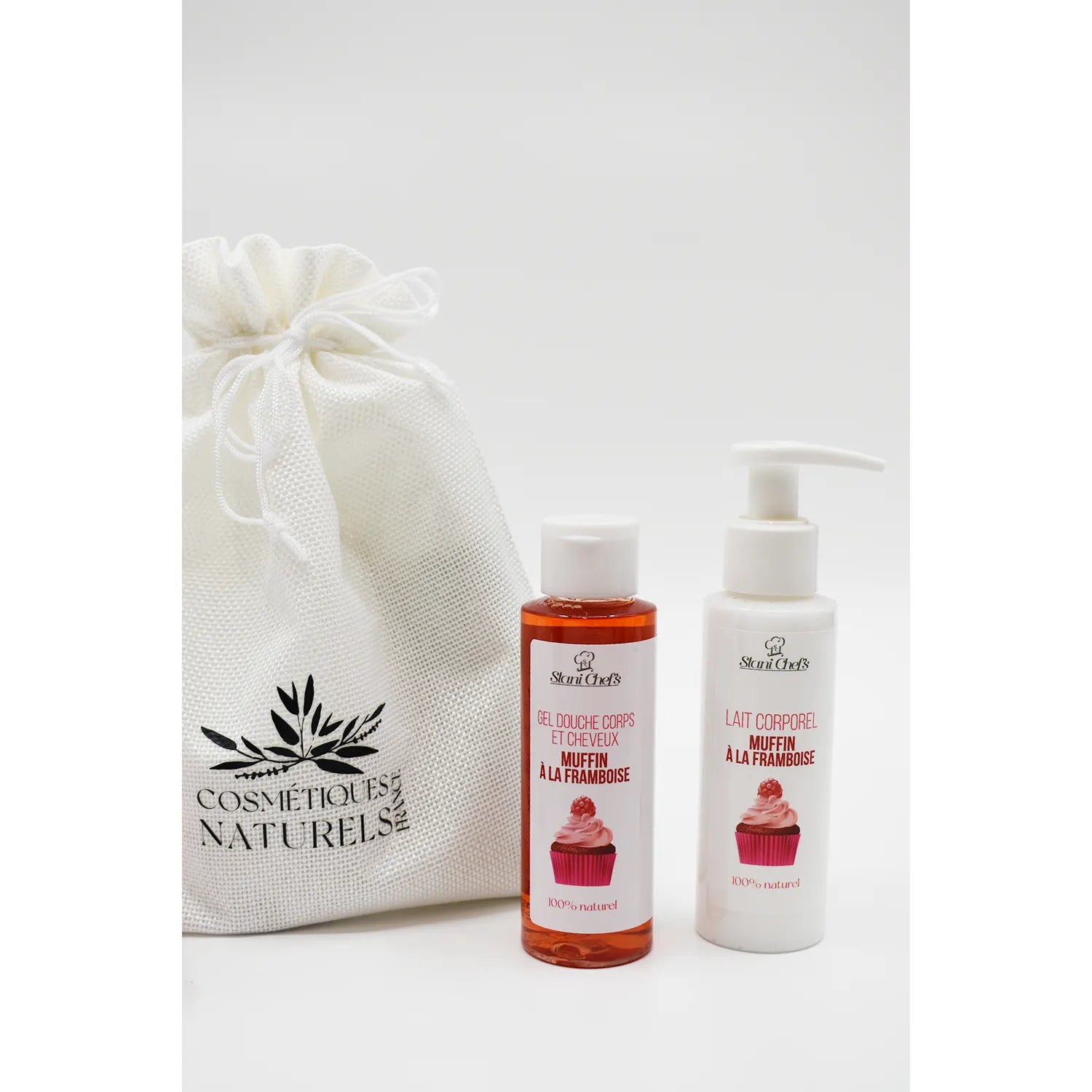 Coffret cosmétique naturel muffin framboise, gel douche et lait corporel, emballage blanc élégant, soin hydratant enfants.