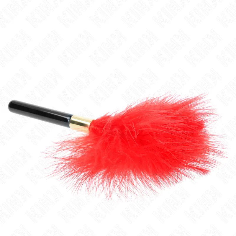 BDSM plumeau rouge en cuir véritable, manche noir ergonomique, accessoire luxueux et durable pour séances intenses.
