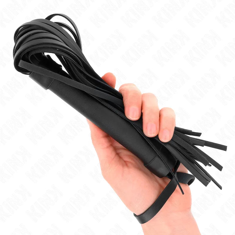 Cravache en cuir noir véritable, ergonomique et durable, pour jeux BDSM, tenue en main, idéale domination et soumission.