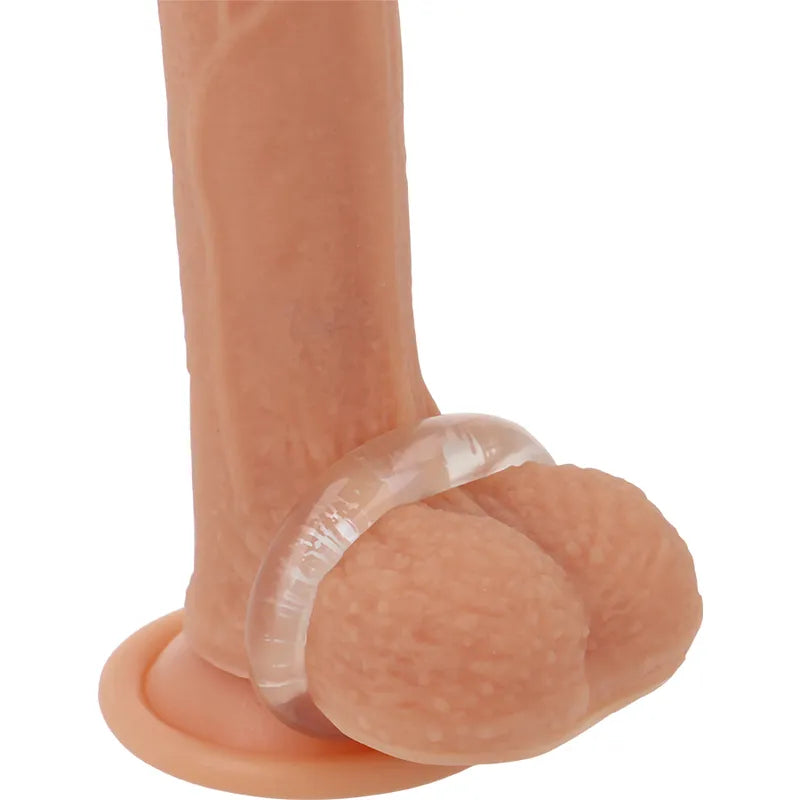 Anneau pénien transparent TPE hypoallergénique, ergonomique, ajusté à la base d'un modèle anatomique, confort et sécurité.