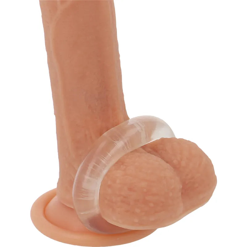 Anneau pénien transparent TPE hypoallergénique, ergonomique, sur mannequin, pour confort et performance optimale.