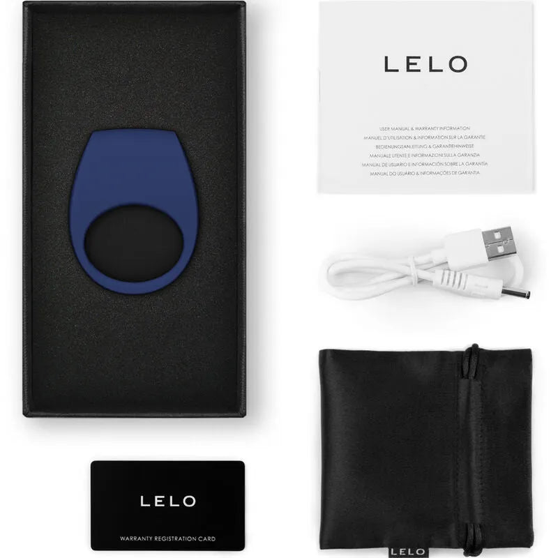 Anneau vibrant connecté bleu en silicone avec accessoires, boîte noire, câble USB, pochette et carte de garantie.