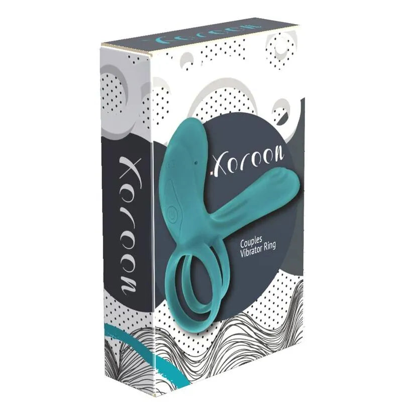 Anneau vibrant Xocoon bleu en silicone, ergonomique, sur fond de boîte design moderne, stimulation clitoridienne et pénienne.