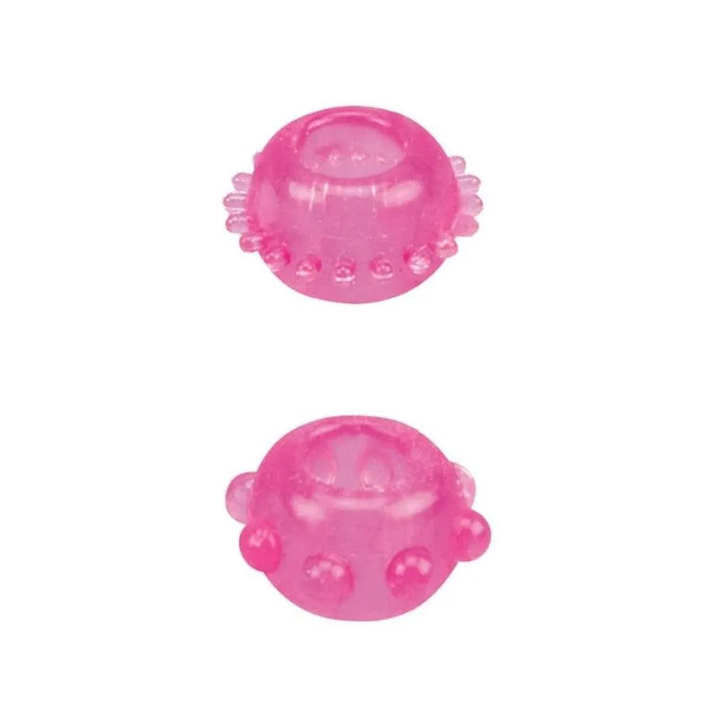 Anneaux péniens roses en TPE avec picots souples, extensibles, pour prolonger l'érection et stimuler intensément.