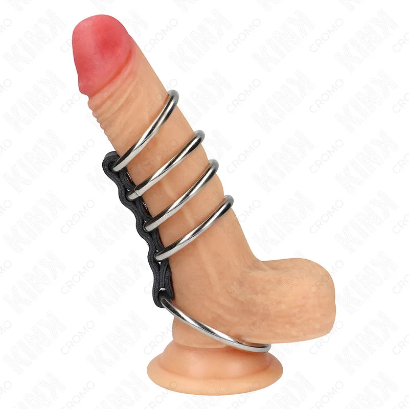 Anneaux péniens BDSM en cuir noir et acier inoxydable, ajustables, sur fond blanc, pour plaisir et contrôle sophistiqués.