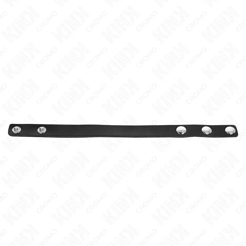Anneau pénien ajustable en cuir noir avec boutons-pression, design élégant pour stimulation intense et confort BDSM.