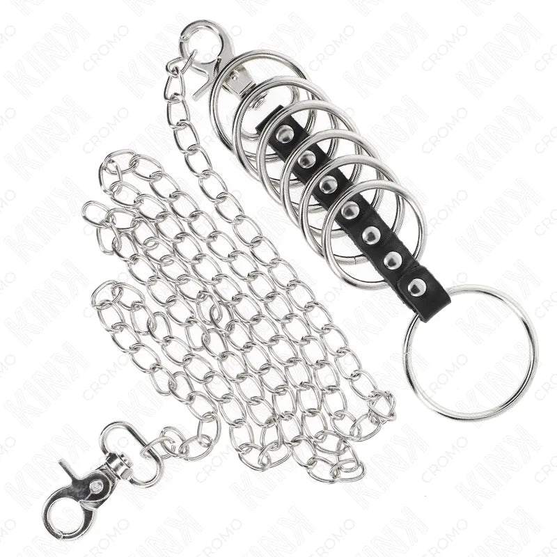 Anneaux péniens réglables en cuir noir avec chaînes métalliques, design BDSM élégant et durable pour stimulation contrôlée.