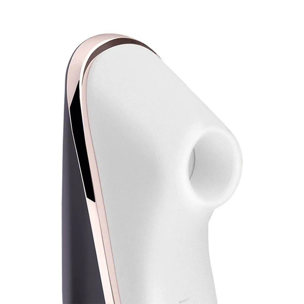 Stimulateur clitoridien Aspire Clitoris blanc et or rose, design compact, technologie Air Pulse, portable et discret.
