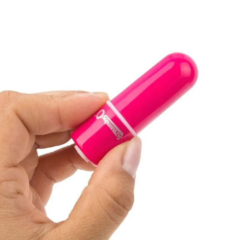 Balle vibrante rose compacte en silicone, rechargeable, submersible, avec dix modes de vibration, tenue en main.
