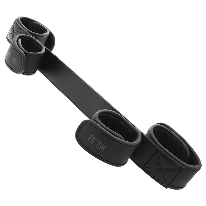 Barre d'écartement BDSM noire en néoprène et cuir vegan, rembourrée, avec attaches velcro pour poignets et chevilles.