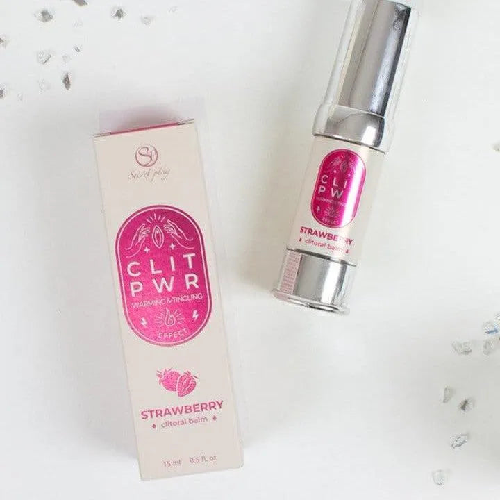 Baume clitoridien fraise 15ml, tube argenté et boîte rose, stimulation intense, absorption rapide, ingrédients naturels.
