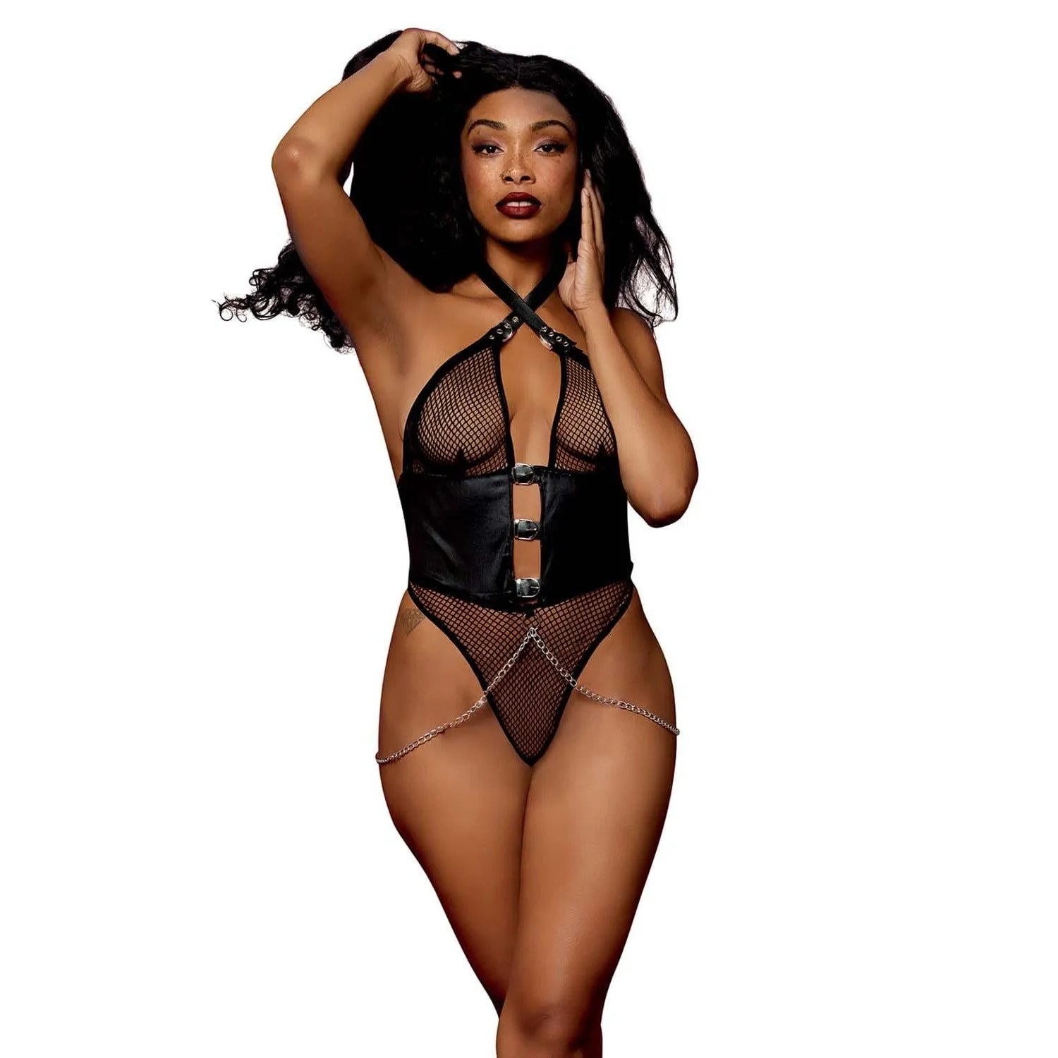 Combinaison string résille noir simili cuir, corset sculptant, bonnets triangulaires, chaînes drapées, style dominatrice.
