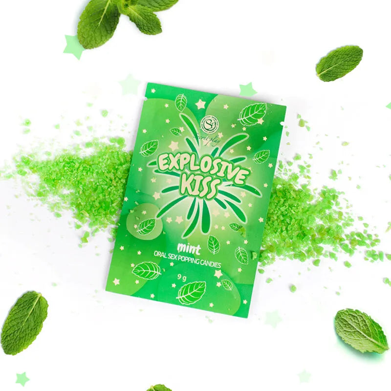 Sachet vert de bonbons intimes effervescents mentholés, avec feuilles de menthe et éclats pétillants pour stimulation orale.