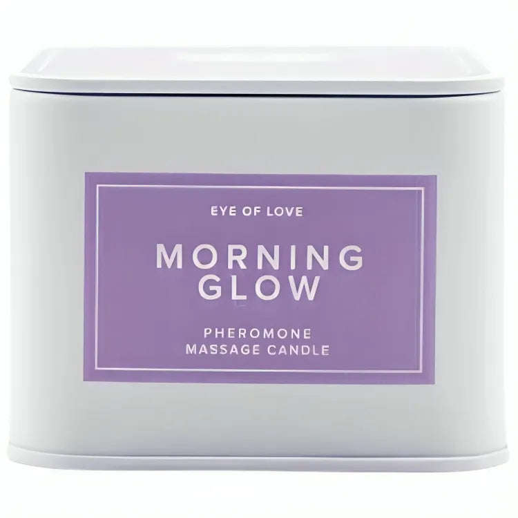 Bougie de massage phéromones, pot blanc, étiquette violette, parfum ylang ylang, jasmin, freesia, musc blanc.