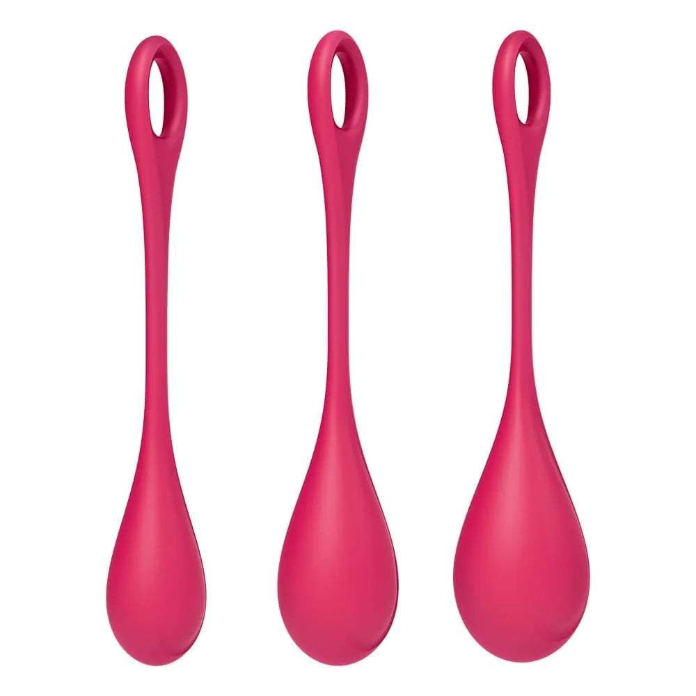 Ensemble de trois boules geisha anales roses en silicone médical, tailles graduées avec anneau de sécurité.