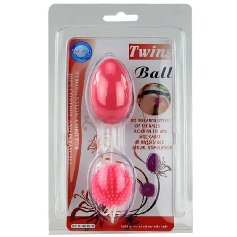 Boules geisha vibrantes roses en TPR et ABS, ergonomiques, avec cordon nylon, dans un emballage transparent.