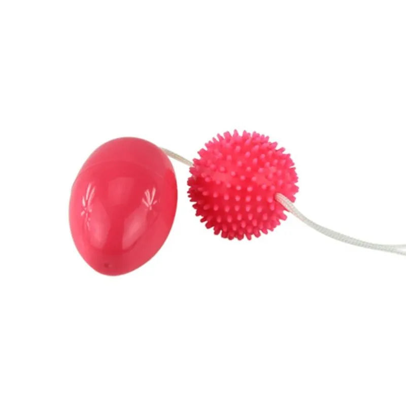Boules geisha vibrantes roses en TPR et ABS, design ergonomique, cordon nylon, stimulation douce et progressive.