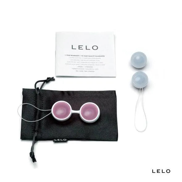 Boules Kegel ajustables en silicone rose et bleu avec pochette satin noire, pour renforcement pelvien postnatal.