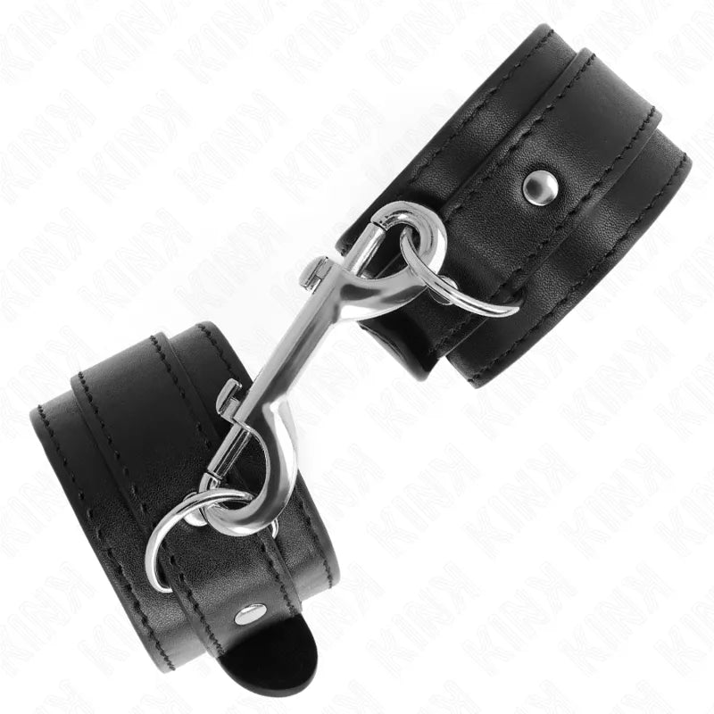 Bracelets BDSM noirs en cuir végétalien, ajustables, avec fermetures métalliques robustes, élégants et éthiques.