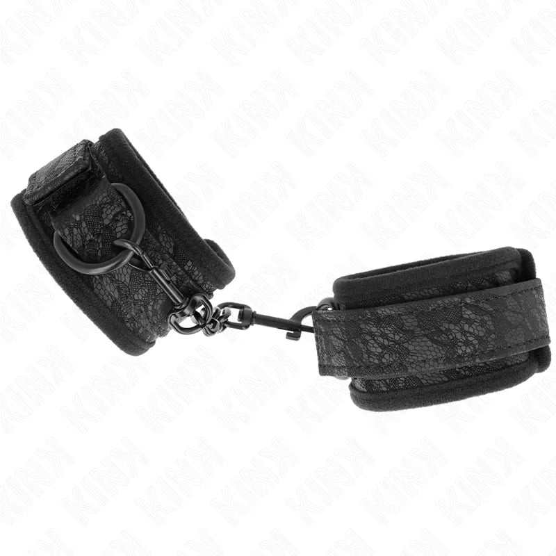 Bracelets BDSM en cuir noir rembourrés, boucles métalliques réglables, design élégant et robuste pour confort et sécurité.