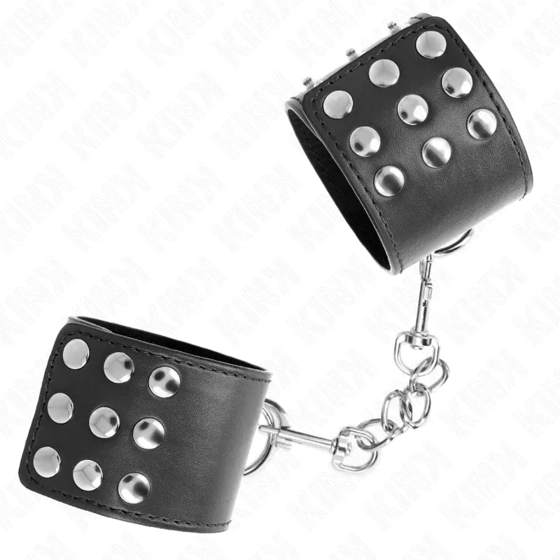 Bracelets BDSM en cuir noir avec boucles métalliques robustes, design élégant et ajustable pour confort et sécurité.