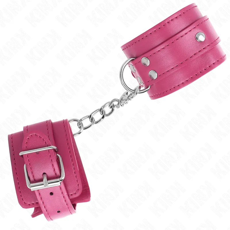 Bracelets BDSM rose en cuir végétalien, rembourrés, boucles ajustables, anneaux D robustes, chaîne métallique.