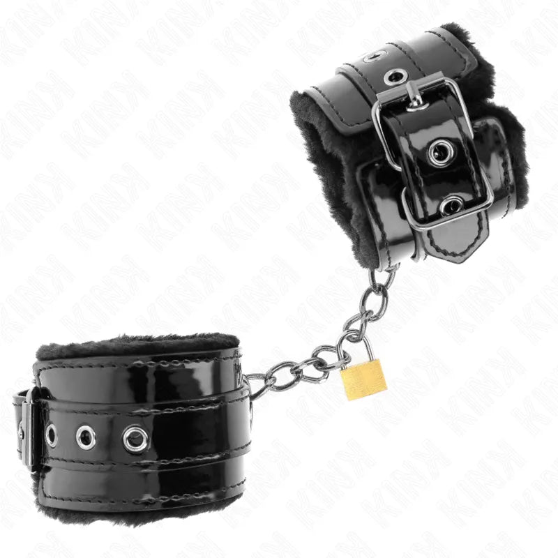 Bracelets BDSM en cuir noir avec fermoirs métalliques robustes et doublure douce, élégance et sécurité pour jeux intimes.