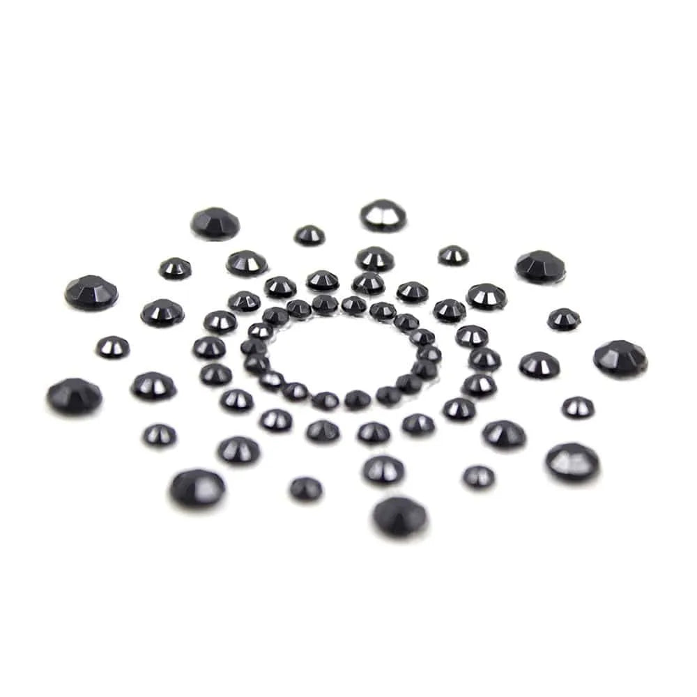 Caches tétons réutilisables noirs en strass acrylique, forme ronde, glamour et discrets pour sublimer la poitrine.