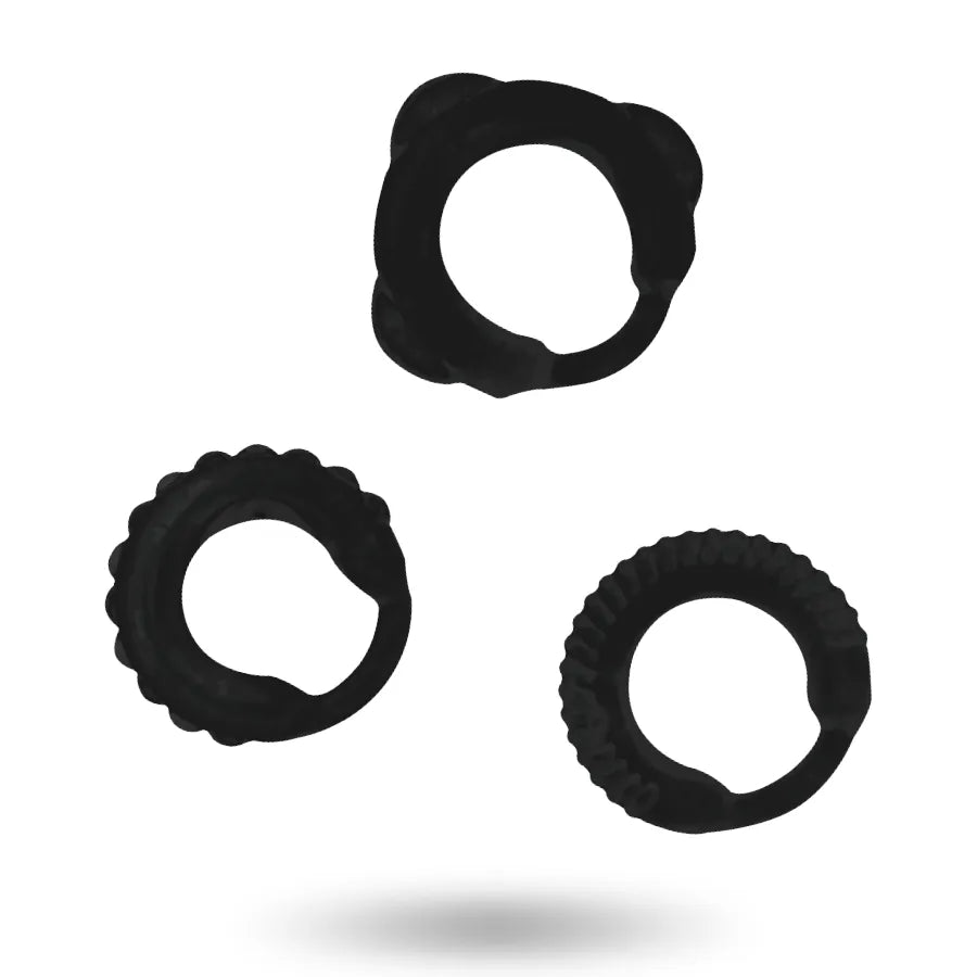 Anneaux péniens noirs ajustables, trois tailles, texture antidérapante, confort thermique, performance érectile prolongée.