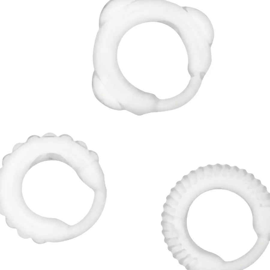 Anneaux péniens ajustables en silicone blanc, trois tailles, surface texturée pour confort et contrôle anti-éjaculation.