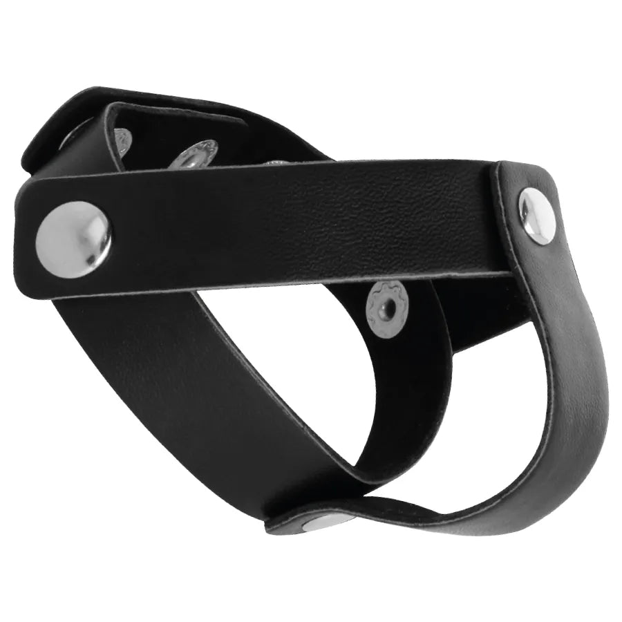 Anneau pénien cuir noir ajustable avec rivets chromés, sangle réglable pour maintien ferme et confort fétichiste.